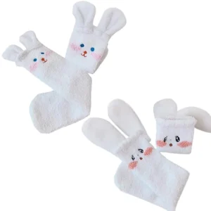 Adorable fuzzy white bunny socks with cute embroidered faces.