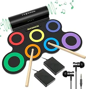 Portable electronic drum set with colorful drum pads, drumsticks, foot pedals, and included earphones.