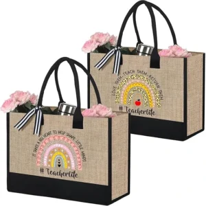 Two burlap tote bags with teacher appreciation designs.