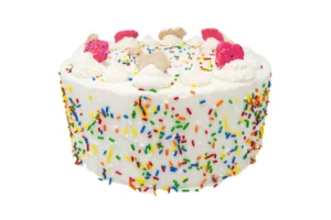 A round birthday cake covered in white frosting, decorated with colorful sprinkles