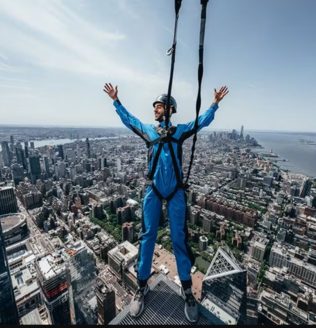 a person enjoying adventorous sky diving which is also called bungee jumping